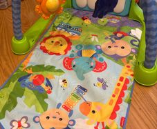 Fisher Price baby mat with piano