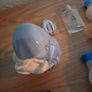 Empty holy water bottles and other religious items Image 10