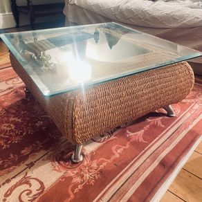 Coffee table with glass top and two matching occasional tables