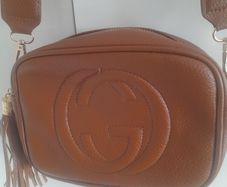 ladies brown long strap cross over bag