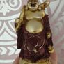 The Hotei (Laughing Buddha) figurine is a talisman of wealth and good fortune. Image 8