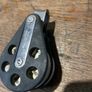 Vintage Barton Marine plain-bearing double blockThis is a classic twin-sheave pulley system featuring original white acetal resin wheels and lightweight dark composite cheek plates with distinctive weight-reduction holes.   Highly reliable, classic gear Image 3