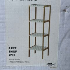shelf unit. This is a neat open shelf unit suitable for a bathroom or kitchen. It is brand new. I haven't even opened the box.