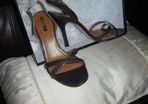 Brown leather sandals.