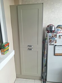 Sage green presses utility room