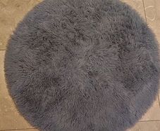 Grey round rug