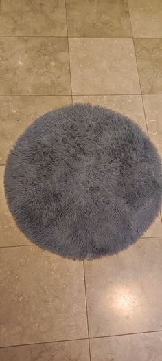 Grey round rug