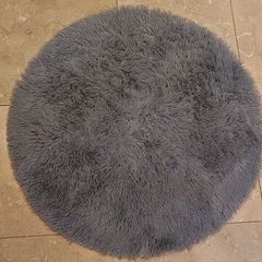 Grey round rug