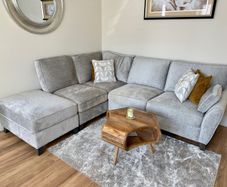 Two month old corner sofa for sale.