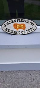 large  golden  flece  cast iron sign