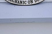 large  golden  flece  cast iron sign