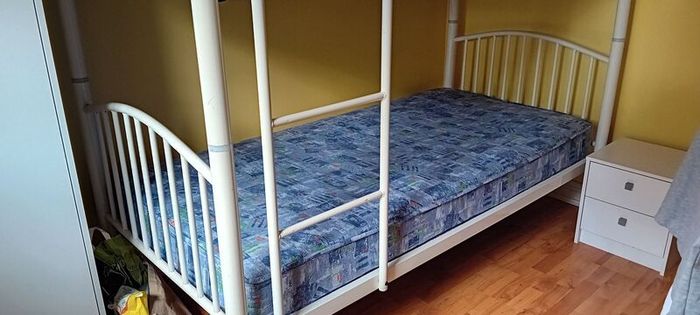white metal bunk beds