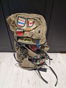 Vintage World Traveler Canvas Backpack  Patch Covered Adventure Rucksack