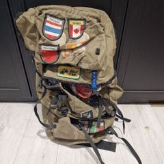 Vintage World Traveler Canvas Backpack  Patch Covered Adventure Rucksack