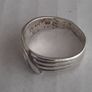 Silver ring clasping hands Image 3