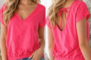 Women's Neon Pink Tie blouse.