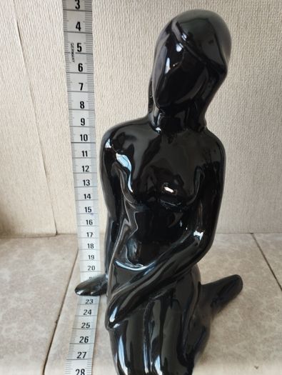 Vintage statue of a seated woman, nude figure, ceramic, glossy black.