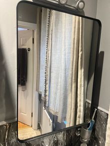 Mirror with storage
