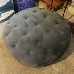 Grey suede round pouff
