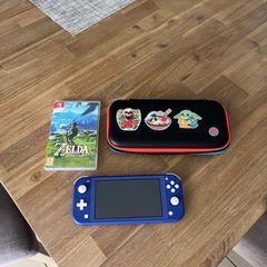 Nintendo Switch Lite + Zelda: Breath of The Wild + Case