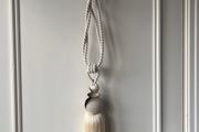 Pair of new cream curtain tiebacks