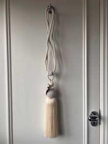 Pair of new cream curtain tiebacks