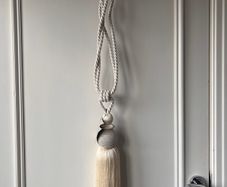 Pair of new cream curtain tiebacks