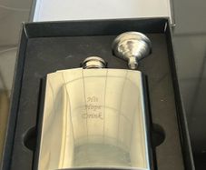 Hip flask with funnel