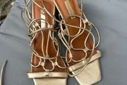 Ladies gold sandals size 4