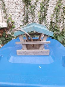 Lovely rustic wooden hanging bird feeder, with open sides
