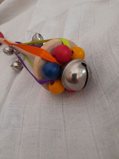 Child's wooden rattle with bells