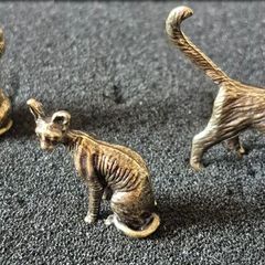 3 brass cats,. Solid brass.
