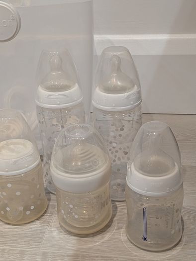 Baby steriliser and 7 bottles