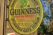 Guinness 2 sided cast iron sign