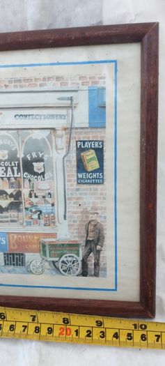 Old advertising shop front picture print ,different brands for sale, in the shop,nice for any home bar or man cave pub restaurant etc,,buyer collects thank you,, rather buyer collects with the glass ,sold as is ,,see pictures for condition
