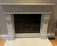 Limestone fireplace with gas fire