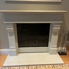 Limestone fireplace with gas fire