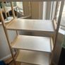 Wooden shelving unit with white shelves Image 4