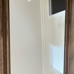 Dark brown wood mirror. Width 103cm Length 75cm
