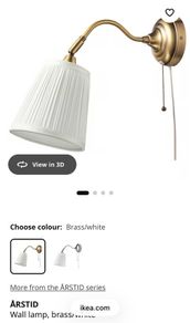 Two Ikea Astrid brass wall lights