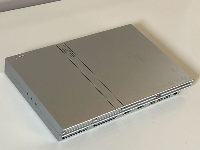 Original Sony PlayStation 2 Slimline Console in Satin Silver Boxed and Beautiful