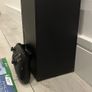 xbox series X with original controller and Jurassic World evolution two and halo infinity Image 2