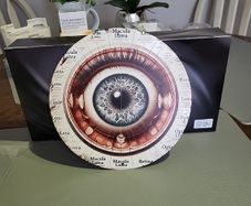 Metal plaque eye ball