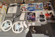 Wii bundle with Mario kart, Sports Resort, Mario Galaxy, Mario &amp; Sonic Olympic