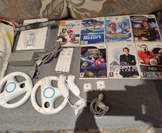 Wii bundle with Mario kart, Sports Resort, Mario Galaxy, Mario & Sonic Olympic