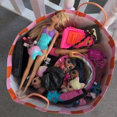 Bag of over 20 LOL dolls and Barbies