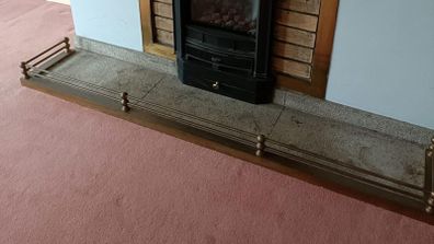 Brass fire fender