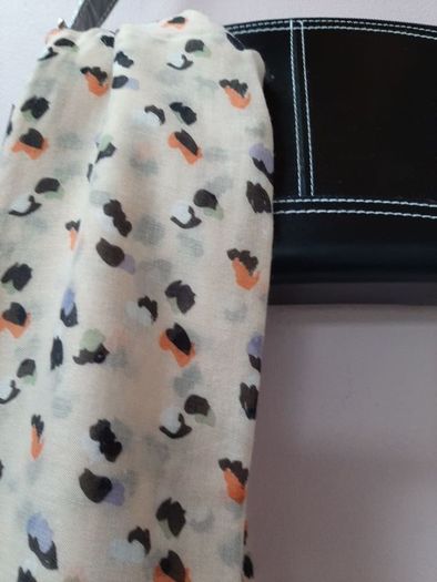 New bag and scarf tags attached