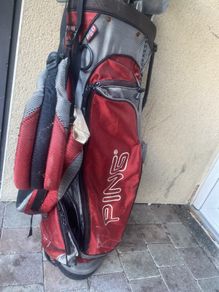 ping bag comes with a mix of golf clubs