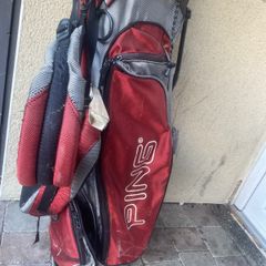 ping bag comes with a mix of golf clubs